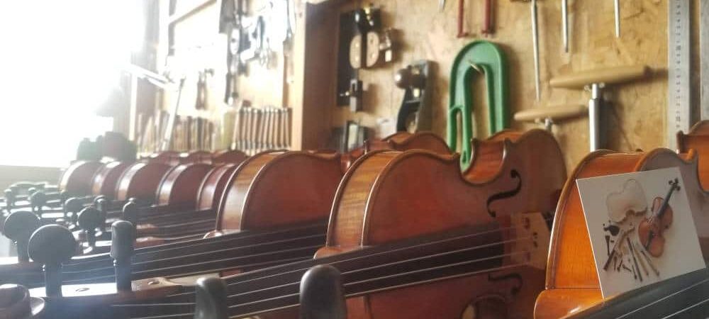 Price of violins in a violin-maker workshop